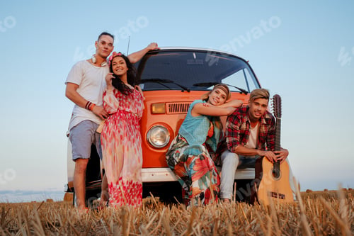 Preview: Hippie friends with guitar on a road trip