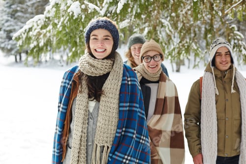 Preview: Group of Friends in Winter Forest