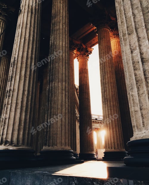 Preview: Ancient columns and beautiful sunshine through them. Old bilduing. Archtiectural monument