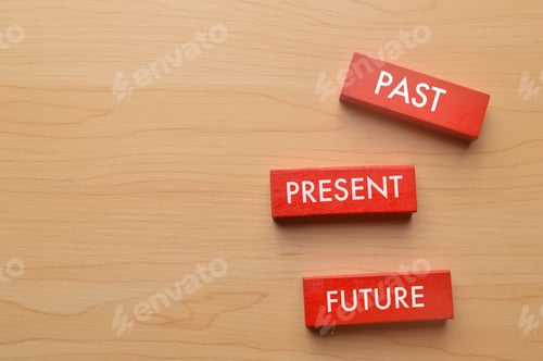 Preview: Wooden blocks written with PAST, PRESENT and FUTURE.