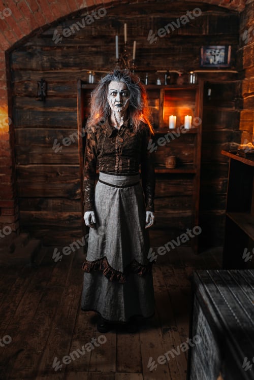Preview: Scary witch stands leaning on a cane, seance