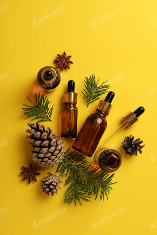 Preview: Aromatherapy concept with pine oil on yellow background