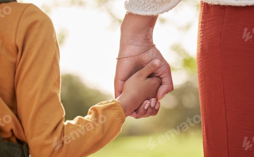 Preview: Mother, kid and holding hands for walking in park for support, trust and care together or bonding i