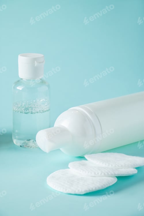Preview: Spa accessories and cosmetics for skin care on blue background. Wellness concept