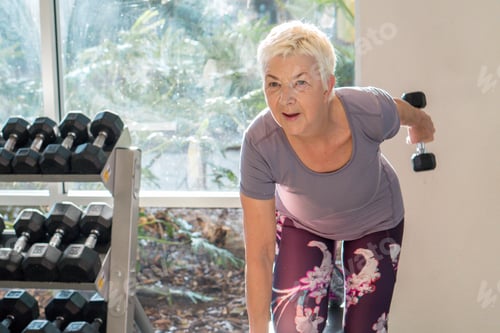 Preview: Senior active woman training at the gym