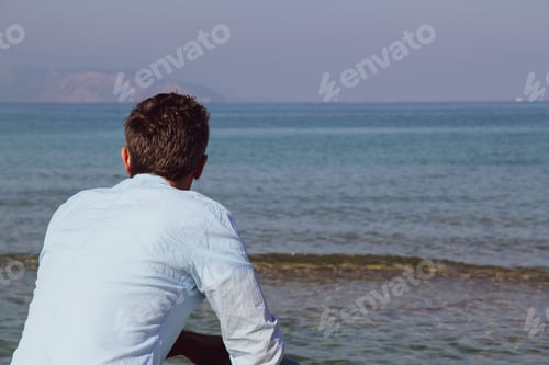 Preview: Man watching the sea