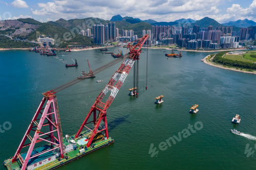 Preview: Tseung Kwan O, Hong Kong 19 May 2020: Top view fly over the sea with floating crane