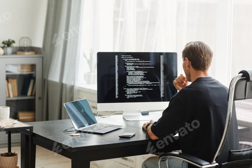 Preview: Computer programmer working on new software program