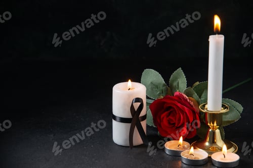 Preview: front view of burning candles with red flower on dark surface war evil death funeral