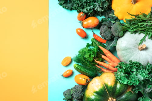 Preview: Autumn vegetables on trendy yellow and green background. Top view. Vegan and vegetarian diet