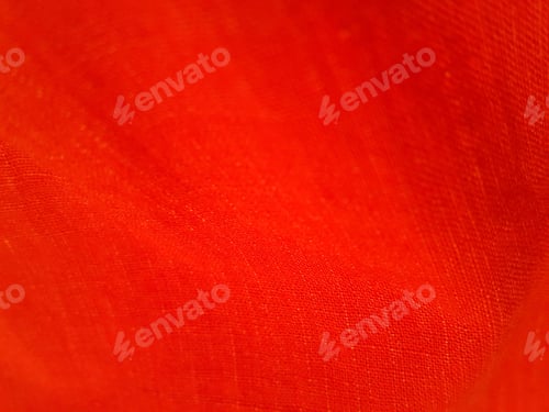 Preview: Close-Up of Textured Red Fabric Swirling Gently
