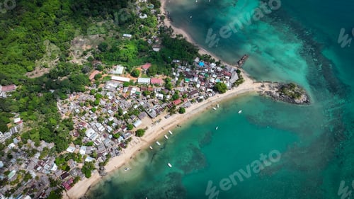 Preview: Aerial view of Nosy Komba Island, Madagascar showcasing vibrant village life