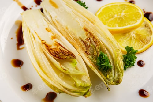 Preview: Chicory roasted or stewed fruit with sauce tasty snack fresh gourmet food background