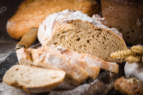 Fresh Baked Bread on Wooden Cutting Board