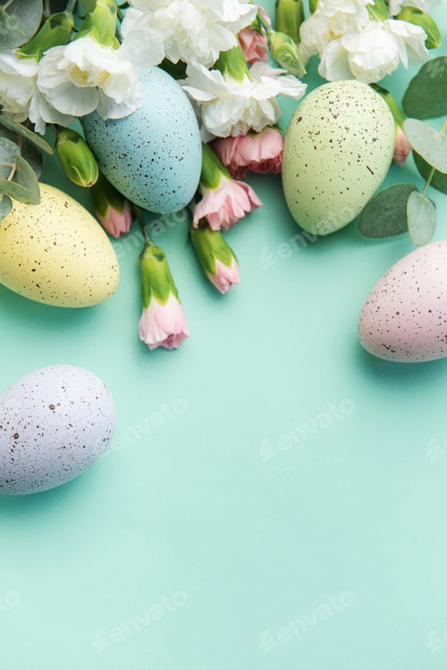 Preview: Easter colored eggs and a bouquet of white and pink carnations with eucalyptus branches