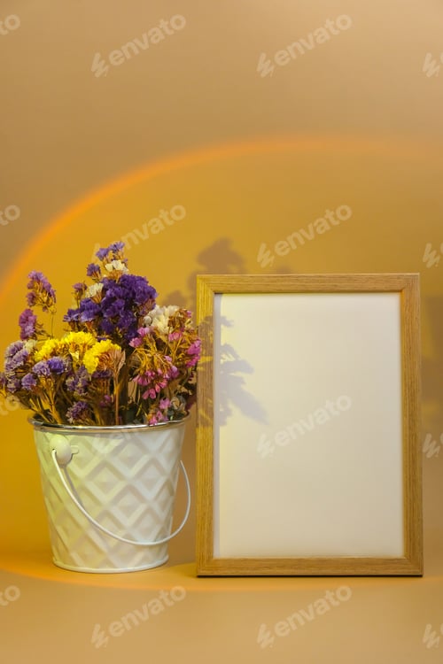 Preview: Mockup Wooden frame with Empty white paper blank and delicate dry flowers in white bucket on beige b