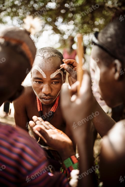 Preview: Traditional face painting in an outdoor setting