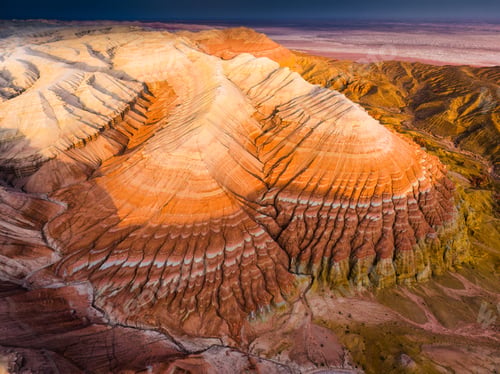 Preview: Colorful layered mountains with geological pattern of Altyn Emel national park in Kazakhstan