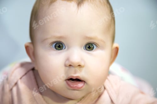 Preview: Snot in a child face close-up. Cold. Selective focus.