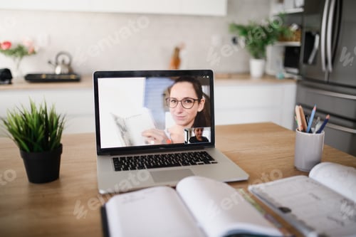Preview: Woman and Child Video Calling from Home Kitchen