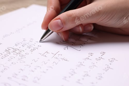 Preview: Student writing different mathematical formulas on paper, closeup