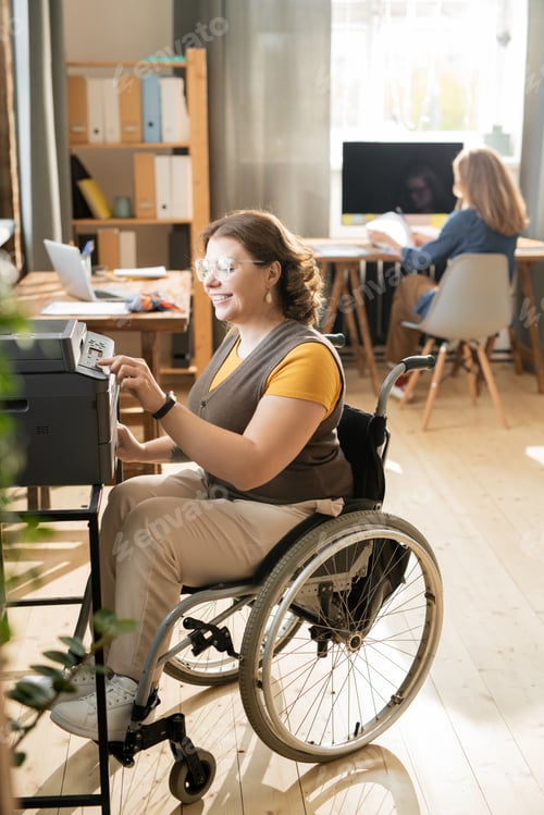 Preview: Woman in Wheelchair Using Printer in Home Office