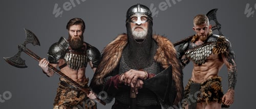 Preview: Three viking from past with axes against gray background
