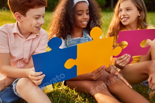 Preview: Diverse kids playing with puzzles together