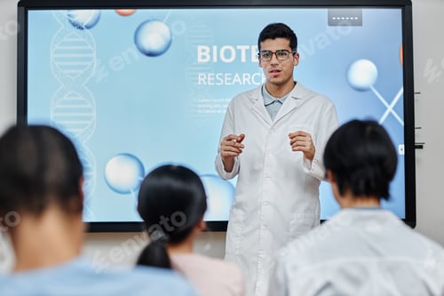 Preview: Male doctor giving lecture or presentation at medical seminar