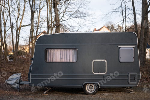 Preview: Closeup shot of a caravan car on the mountain