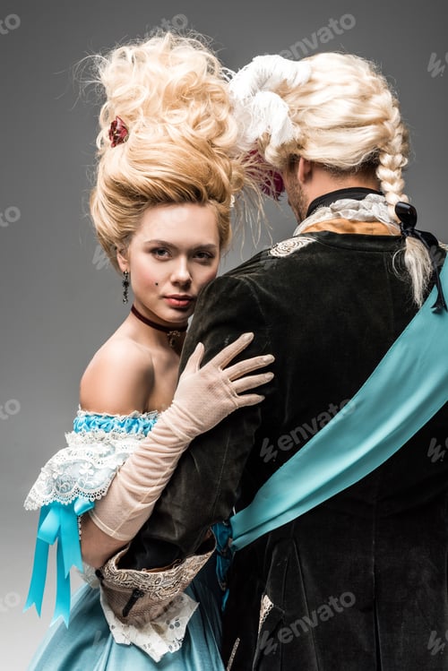 Preview: back view of man hugging attractive victorian woman in wig on grey
