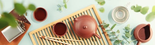 Preview: Beautiful set for traditional tea ceremony on pastel blue background