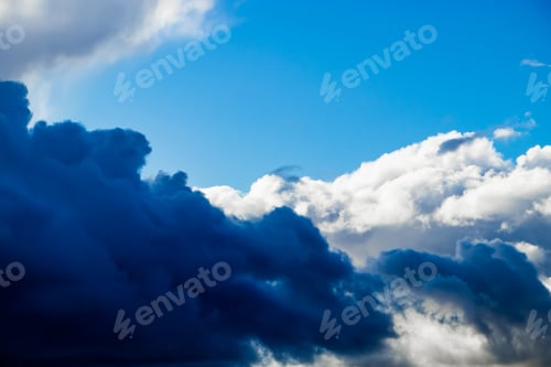 Preview: Storm clouds on a blue sky. Background for design.