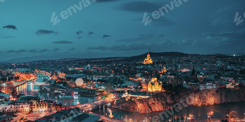 Preview: Tbilisi, Georgia. panorama night dusk evening Top View Of Famous Landmarks In spring sunset Evening