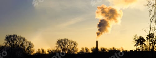 Preview: Sunset view of factory emissions polluting the atmosphere
