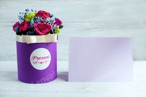 Preview: A bouquet of flowers on a white background. The concept of greetings on the occasion.