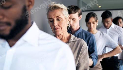 Preview: Shot of a group of businesspeople waiting in line