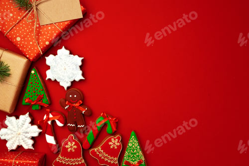 Preview: Blank sheet of paper with Christmas gift and gingerbread cookies on red background
