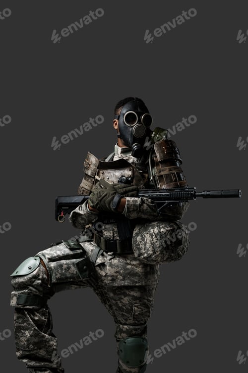 Preview: African military man dressed in uniform and gas mask