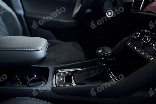 Preview: Inside of front part. Close up focused view of brand new modern black automobile