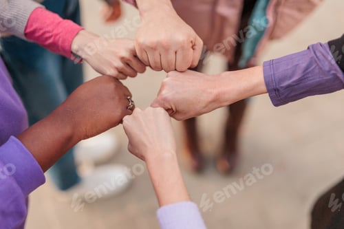 Preview: feminist movement hands togetherness group of multicultural woman