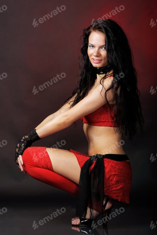 Preview: Woman Sitting In Red Dance Costume