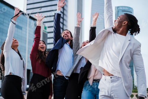 Preview: Group of businesspeople celebrating teamwork in financial district