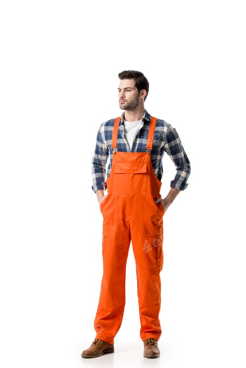 Preview: Young confident repairman in orange overall isolated on white