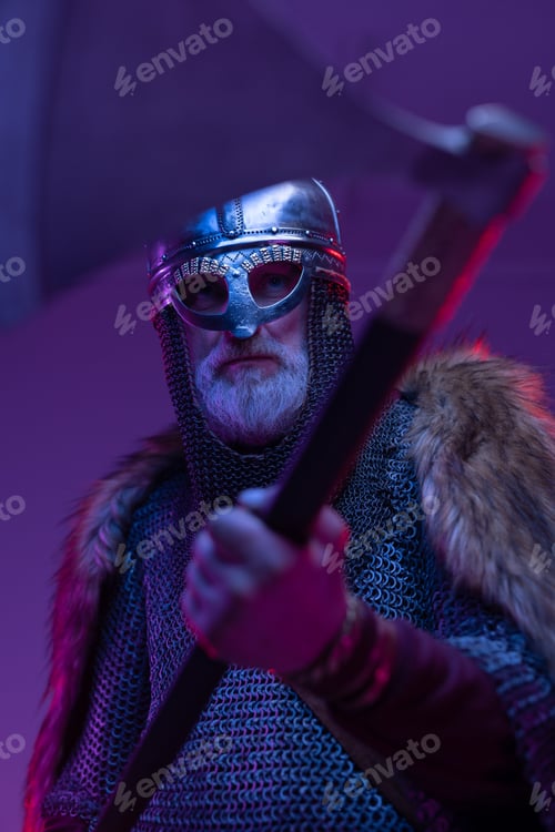 Preview: Closeup studio shot of elder viking warror with axe