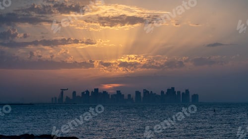 Preview: Golden hour at Doha skyline, Visit Qatar, explore Qatar, city, urban, travel, tourism, plane, orange
