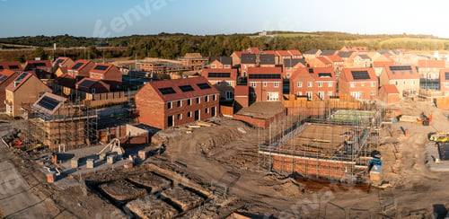 Preview: Aerial panoramia view directly above a new build housing estate in the UK