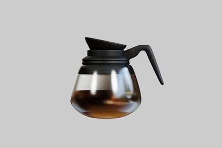 Preview: Glass coffee pot with dark liquid and pouring droplets