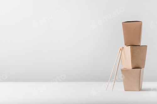 Preview: three noodles boxes with chopsticks on table