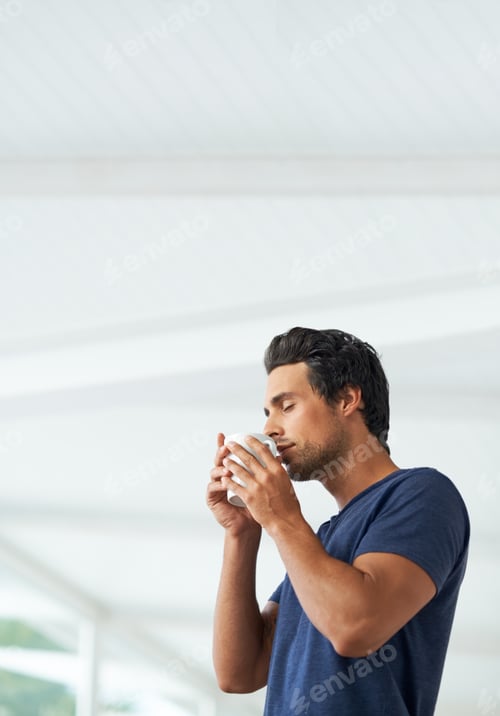 Preview: Savoring the aroma of a freshly ground cup of coffee